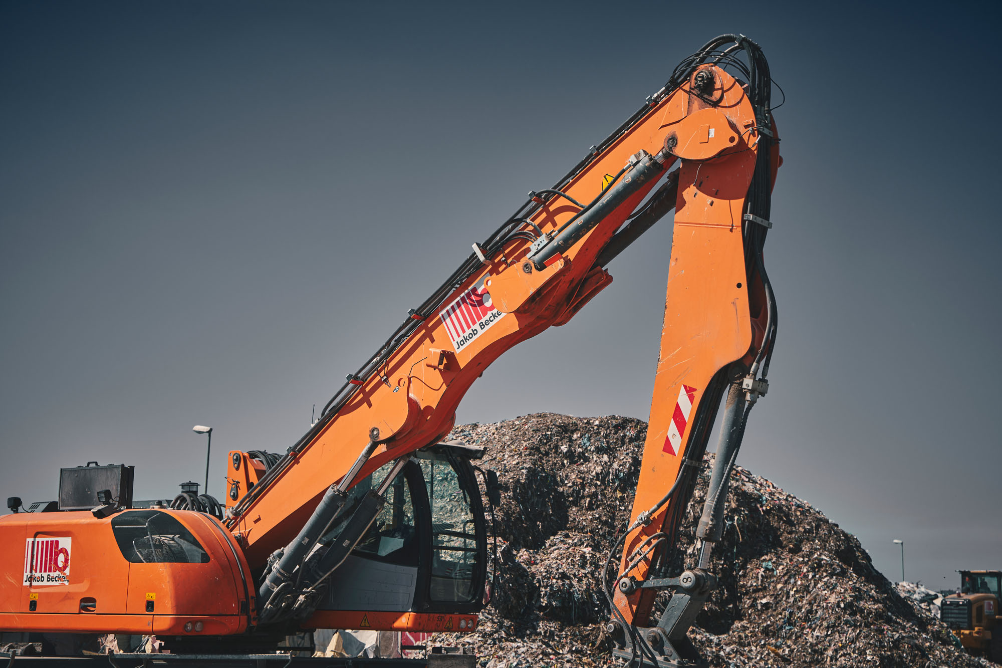 Sortieranlage mit Bagger/Greifer Jakob Becker